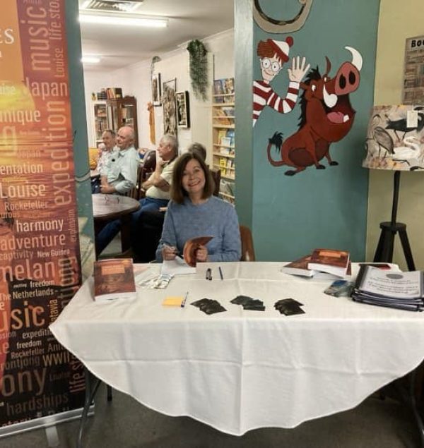 Me behind the signing table 459678336_1046169657514451_8921682966270716493_n